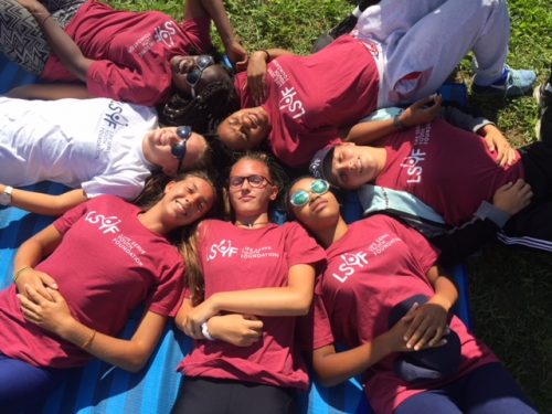 Good photo of kids lying down in circle